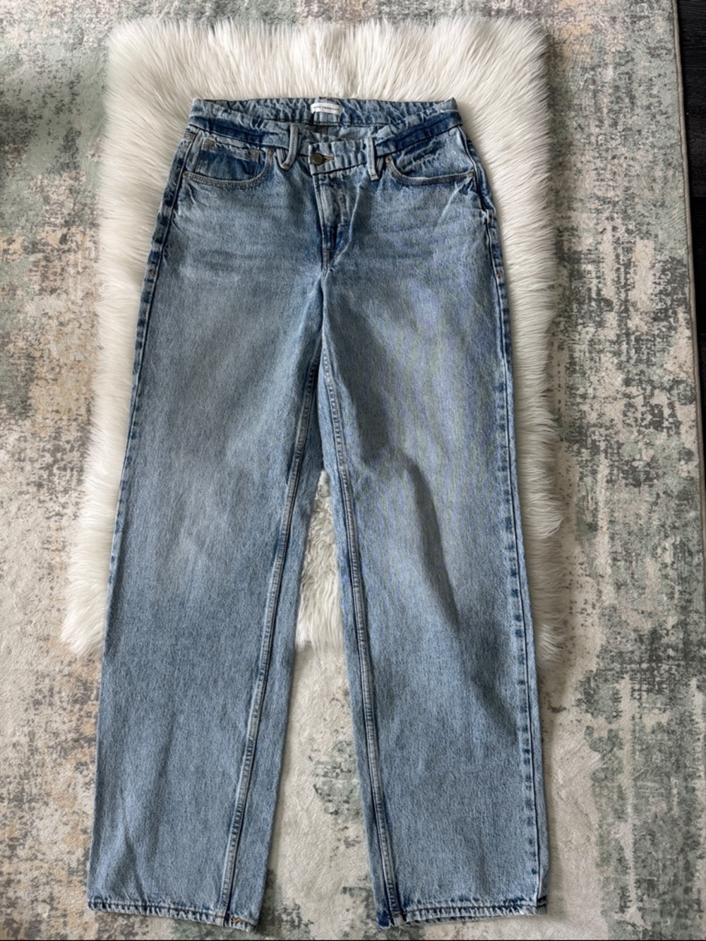 Good American asymmetrical cross over waist Light Wash Blue straight leg Jeans